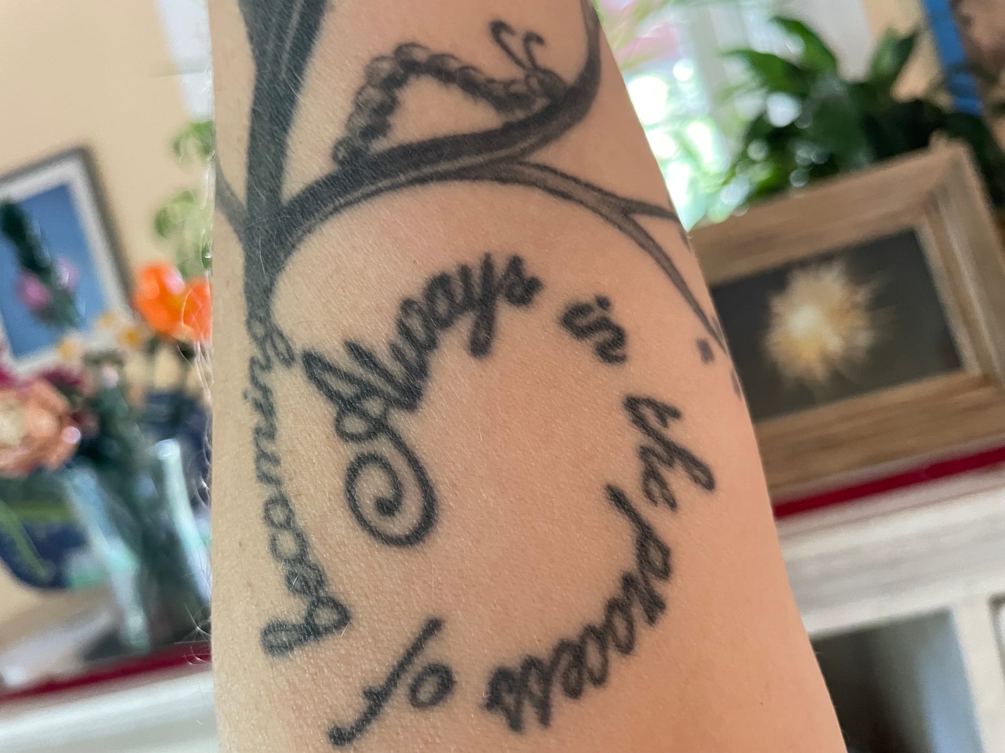Tattoo of the words always in the process of becoming